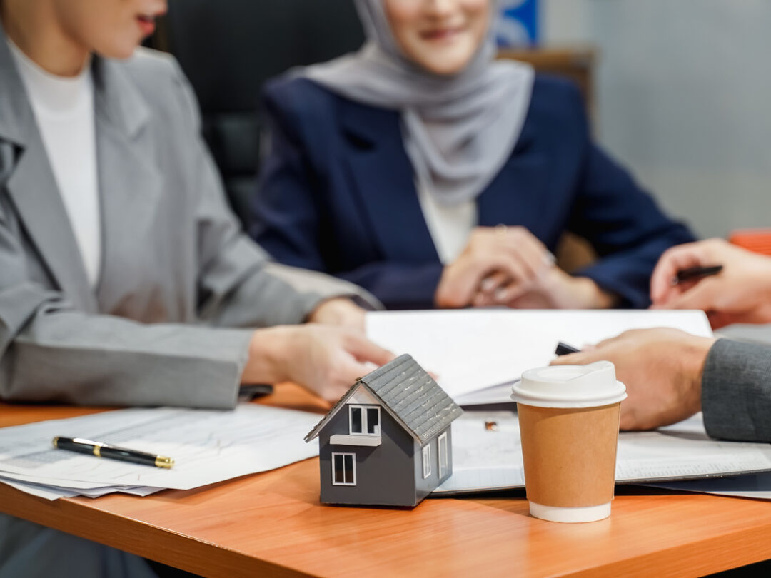 home loan and insurance Business meetings conference success of real estate brokers after banking agreement signing a contract success deal happy successfully